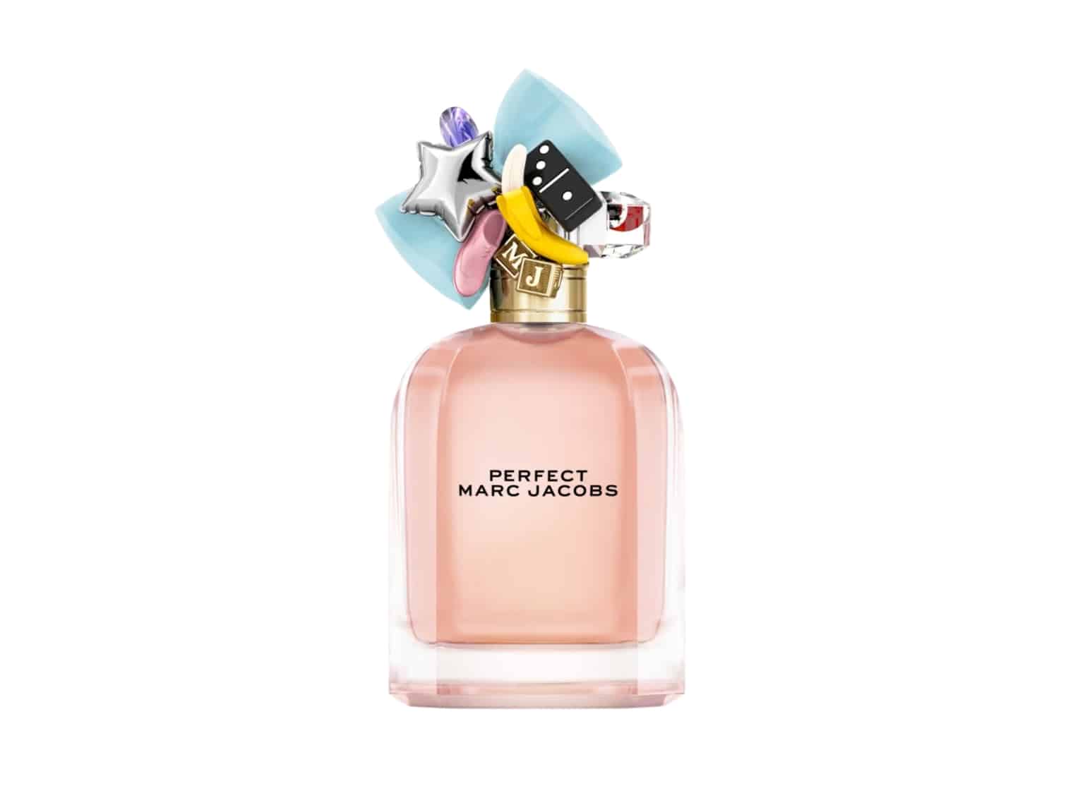 A bottle of "Perfect Marc Jacobs" perfume with a decorative cap featuring various playful charms, including a star, banana, and domino—perfect for your vanity or captured brilliantly in both small format printing.